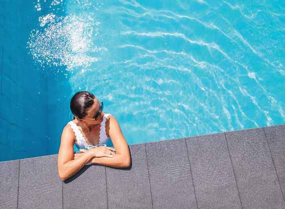 45+ amenities at Hiranandani Maitripark including resort pool, bowling alley, and Miyawaki forest